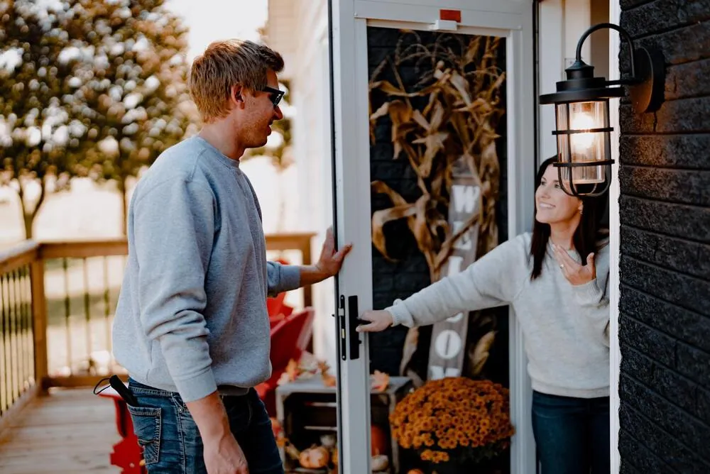 MPV technician greeting a customer at the door